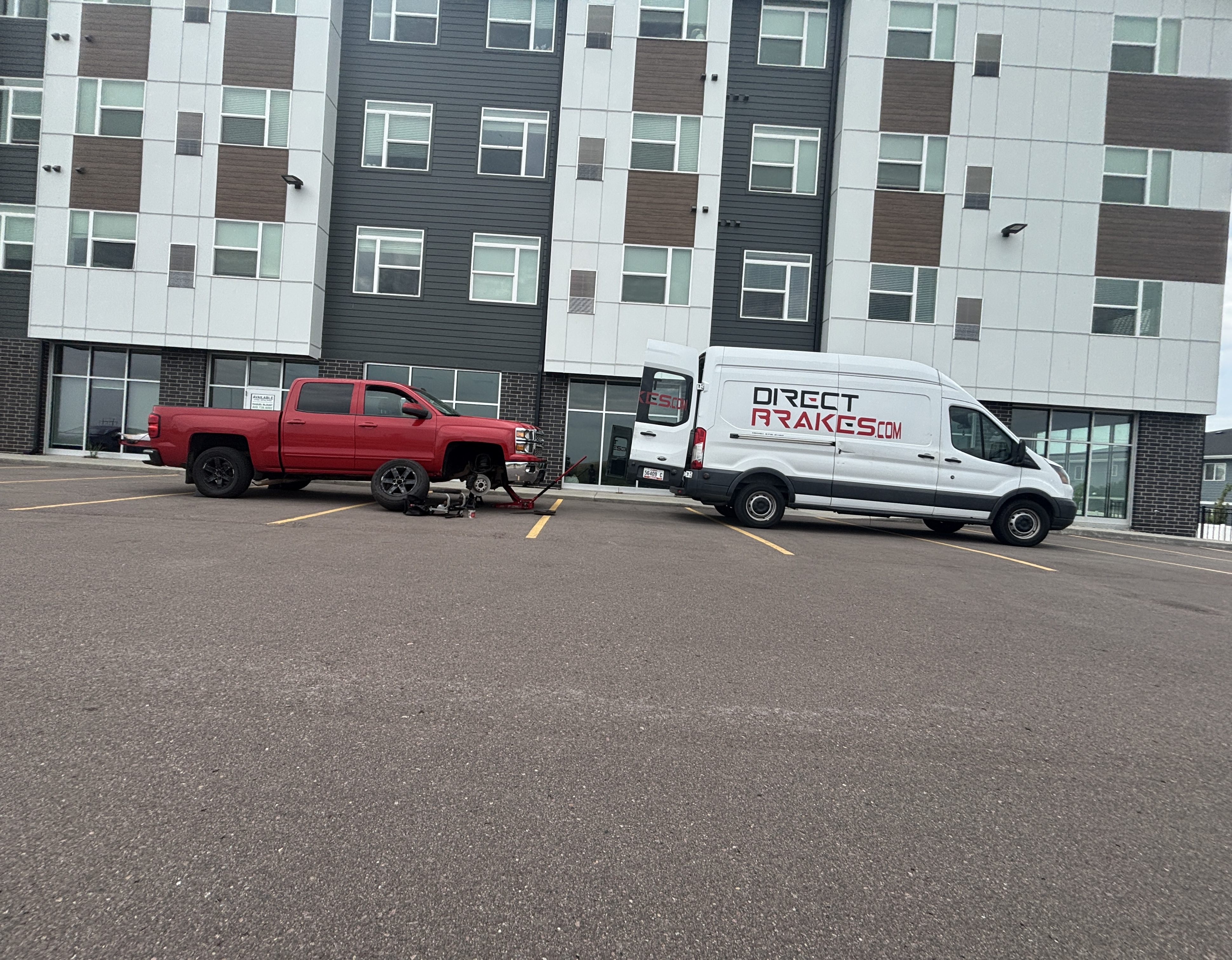 Mobile mechanic performing brake repair on Toyota 4Runner