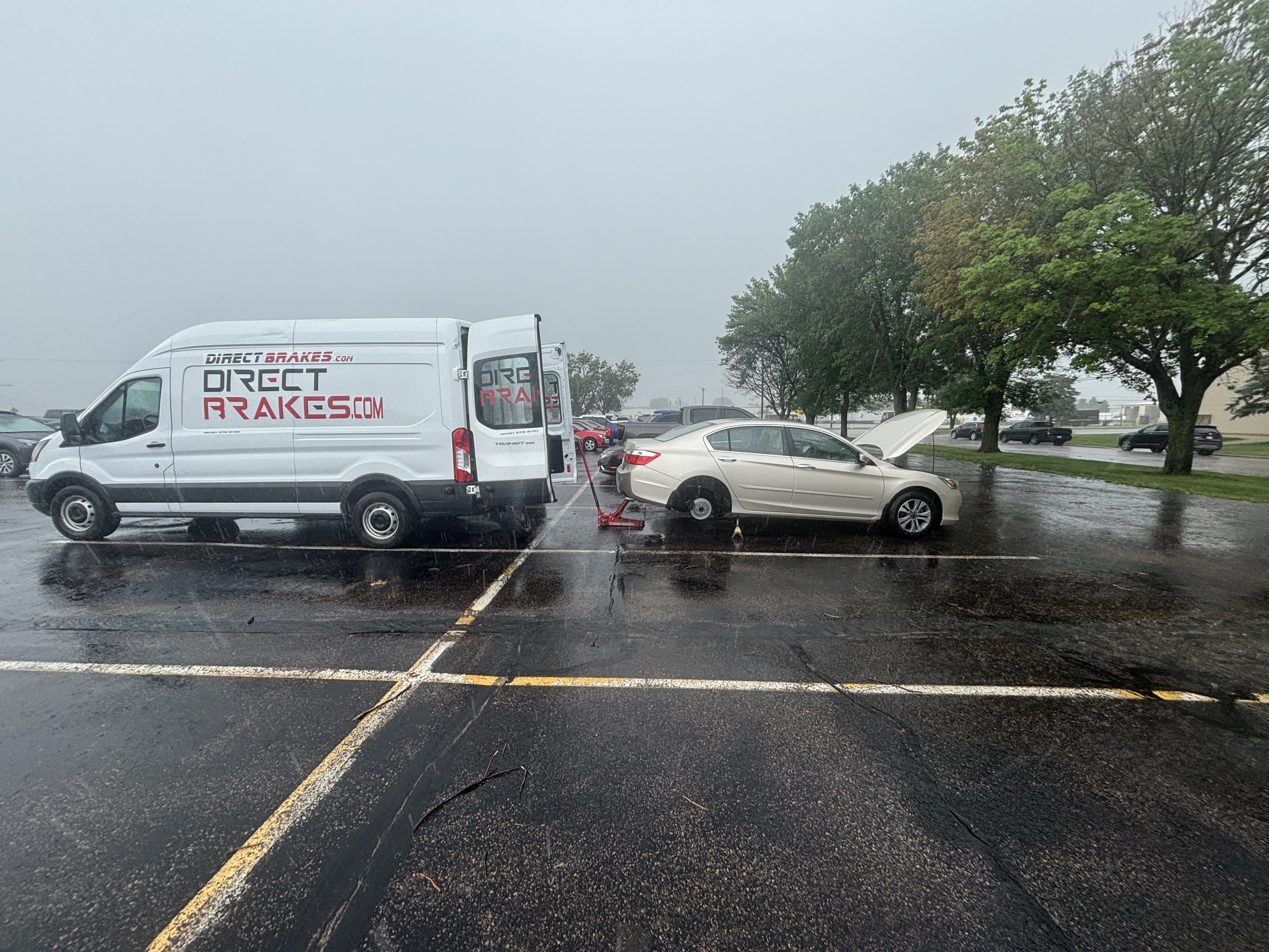 Direct Brakes technician working on vehicle